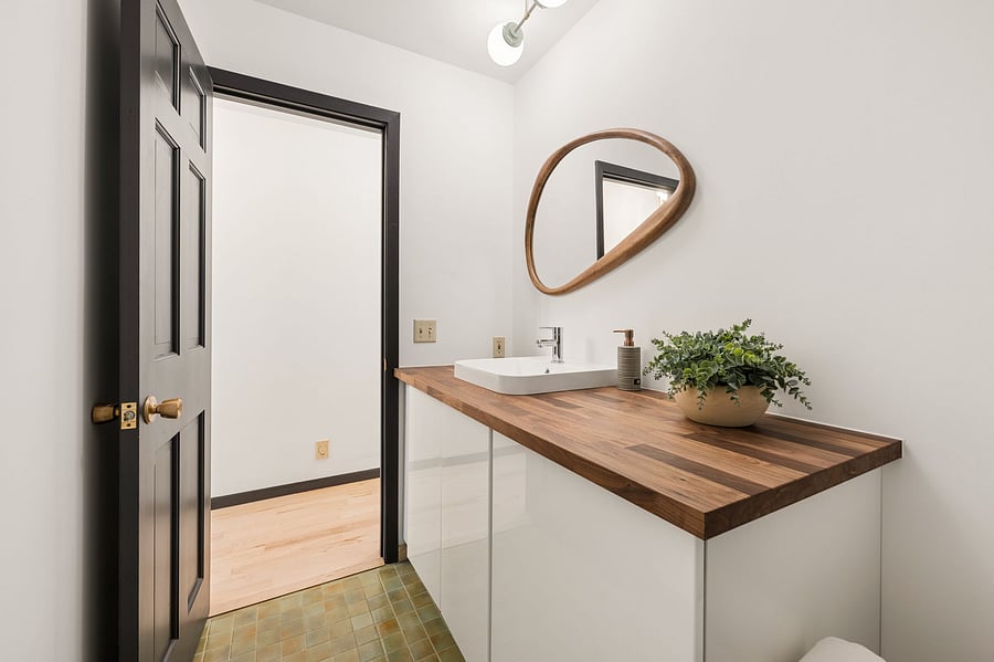 The recently updated second full bathroom includes a large vanity with plenty of storage. Just across the hall from the second bedroom.