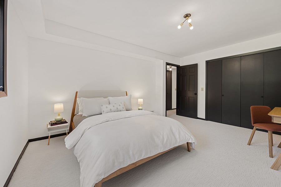 Just off the family room. the ground level boasts two additional bedrooms furnished with desks for work from home flexibility. Brand-new memory foam queen mattress and premium linens.