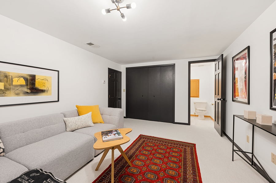 The lower-level bonus room has its own ensuite powder bathroom, along with a large cedar closet.