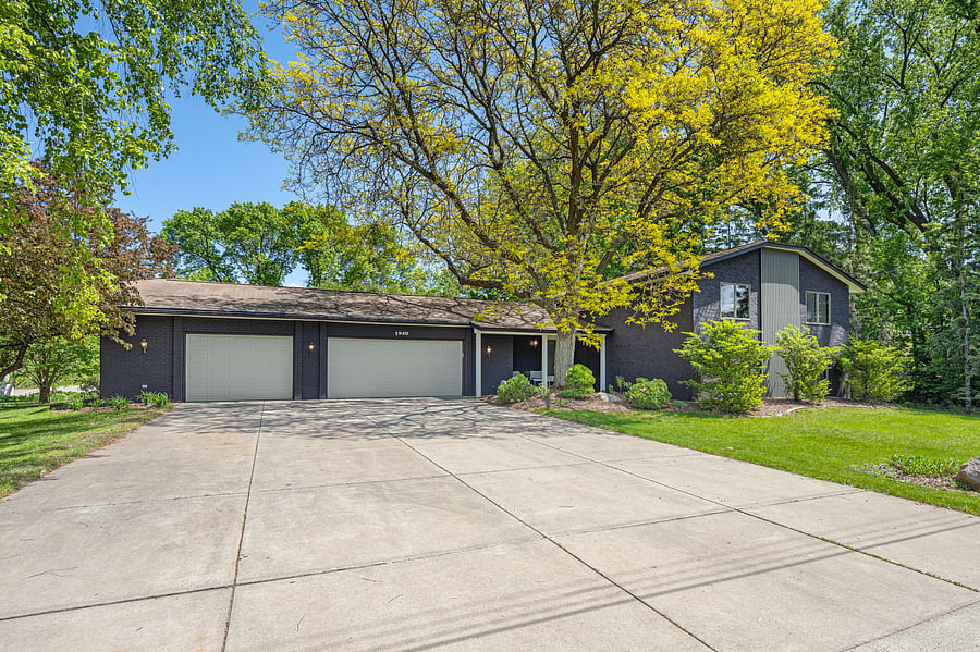 Three car garage plus extra large driveway. Lawn care and snow care included.