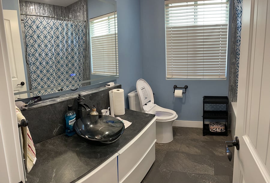 Clean shared bathroom conveniently located near the bedroom
