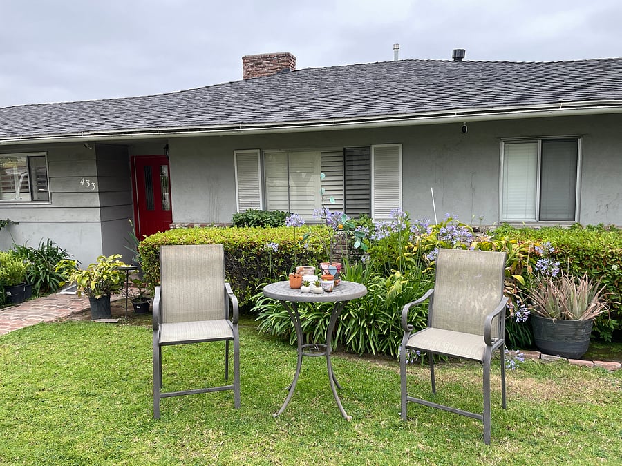 Peaceful front yard with outdoor seating