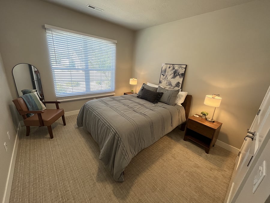 Guest bedroom, queen bed, large closet with built-in shelving.