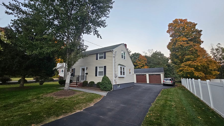 Set back from road, quiet neighborhood, sidewalks, lit streets, ample parking and garage storage if needed.