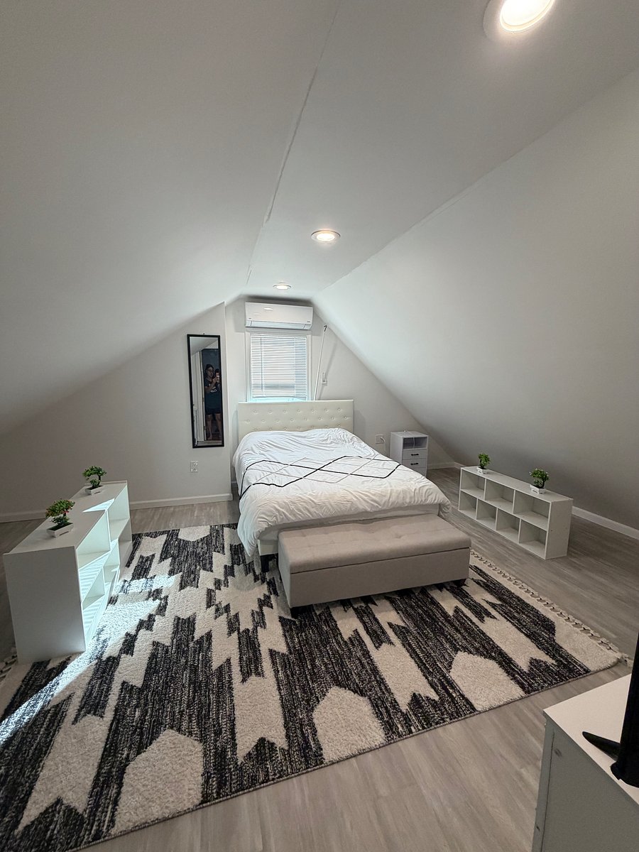 Bedroom with TV and desk