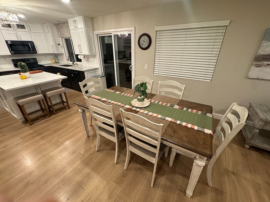 Long and wide dining table seats six. Leaf extends it an extra 18"