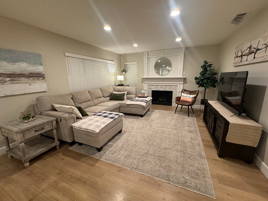 Family room with gas fireplace and smart TV
