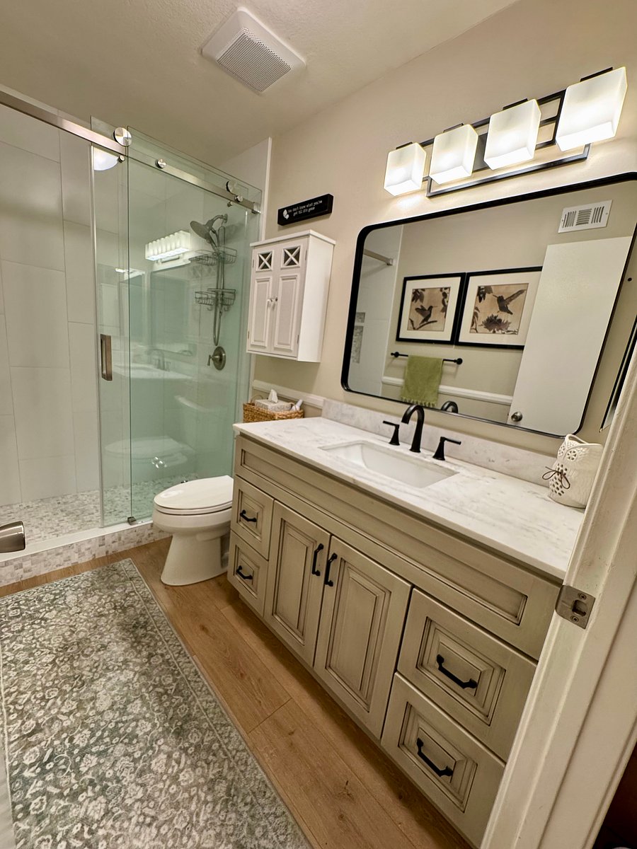 Downstairs full bath with walk-in shower snd 6" curb