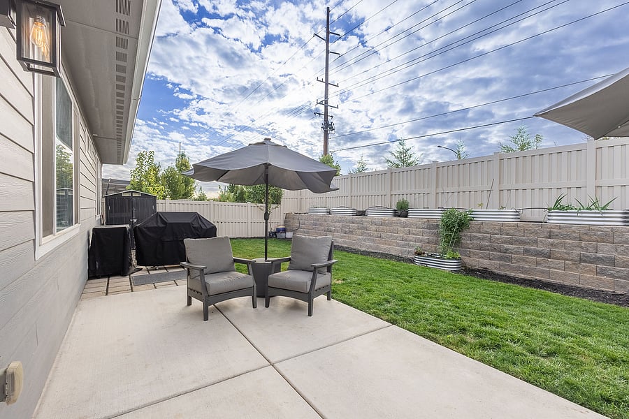 Extended patio with BBQ pad. Propane grill and accessories included.