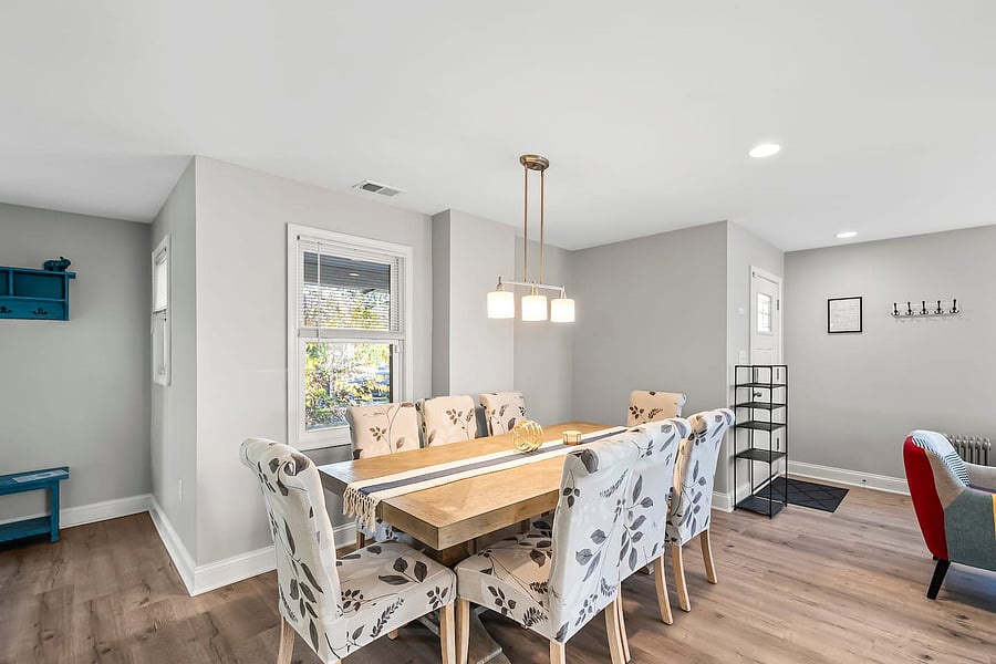 Sit, eat, relax - 8 comfy chairs around a hardwood table.