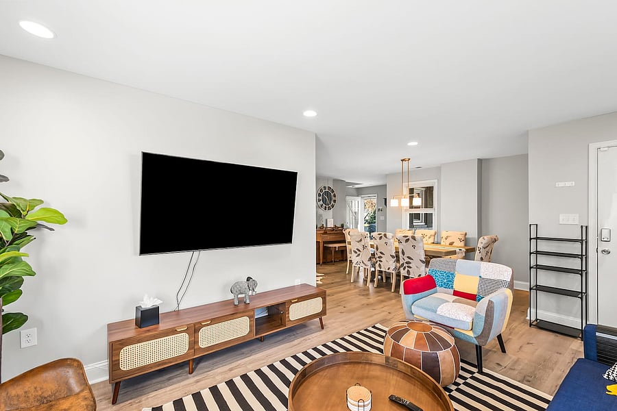 Relax together in our living room with a 70" TV, contemporary furnishings, and a warm, cozy atmosphere.