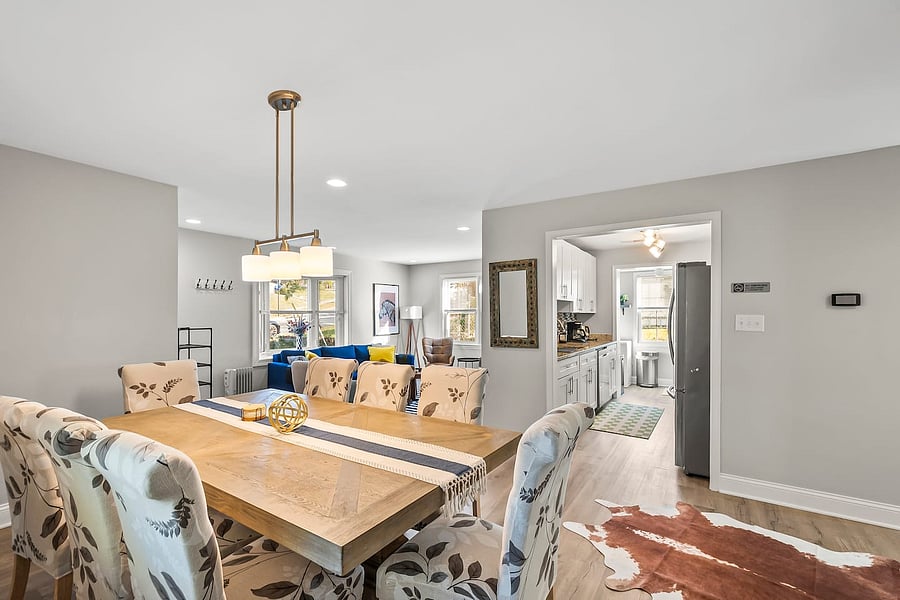 Cozy dinners start here - table for 8 with comfy chairs.