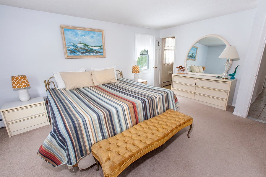 Master Bedroom with king size bed and private full bathroom.