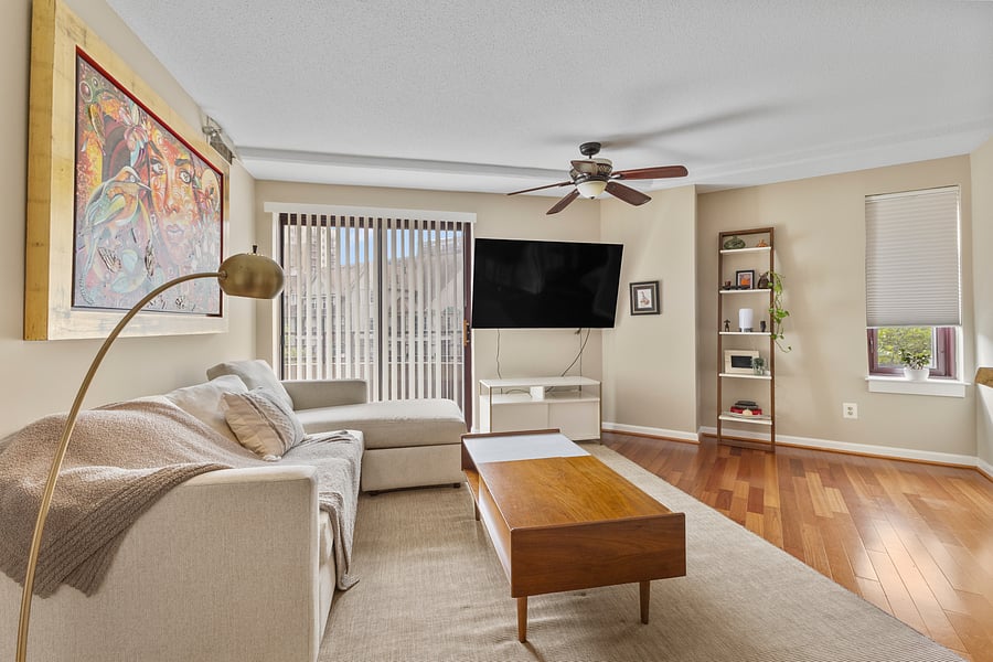 Open living area with a Smart TV and high-top dining table