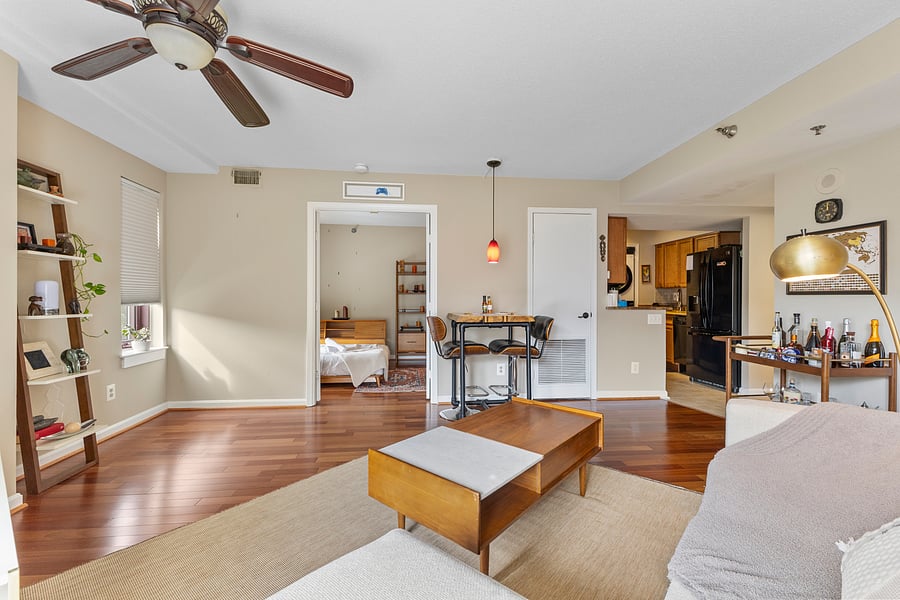 Open-concept layout connecting the living room, kitchen, and bedrooms