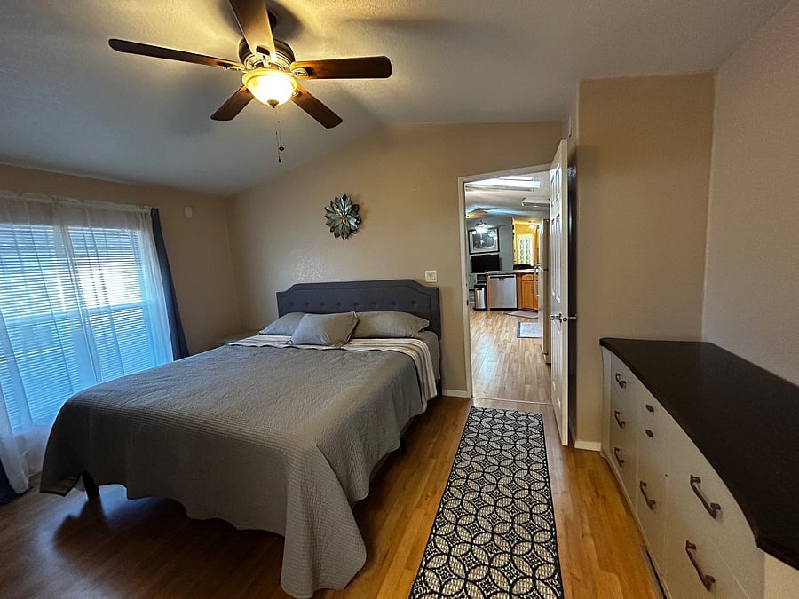 Master bedroom next to kitchen.