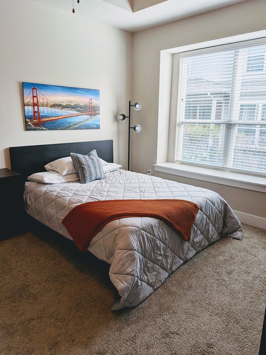 Queen bed in primary bedroom