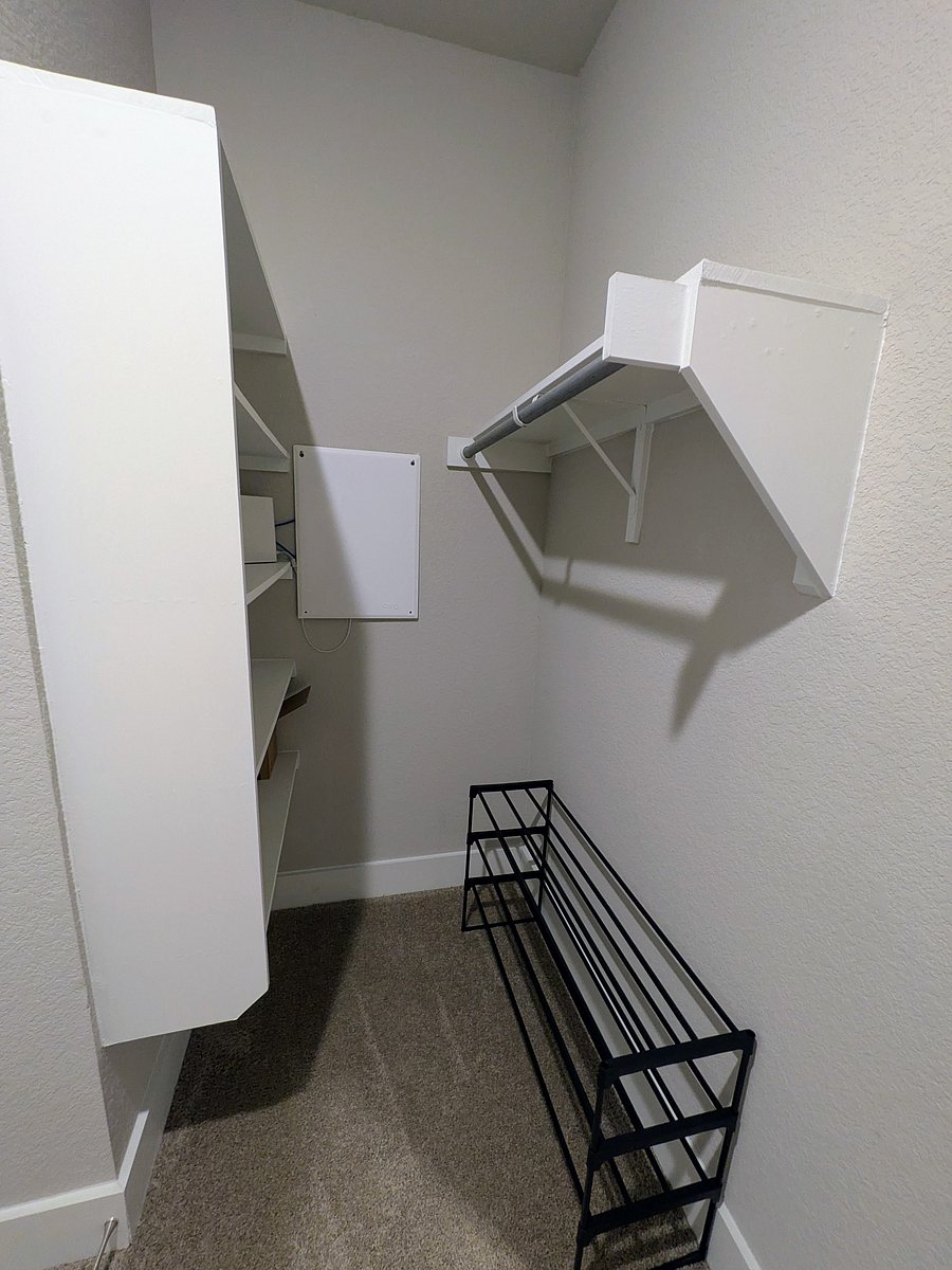 Primary closet shoe storage and additional hang space