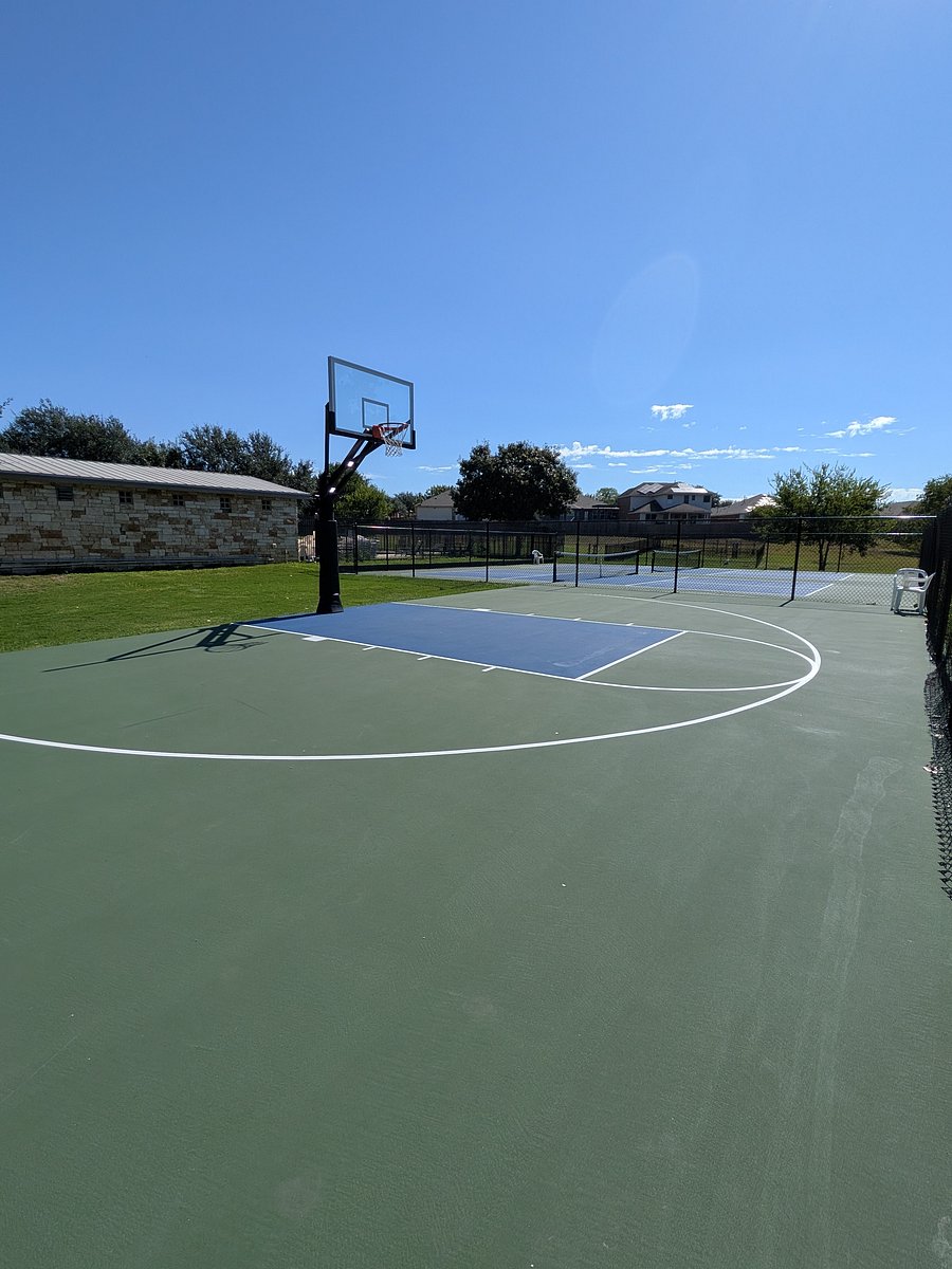Gated community basketball court open year round.