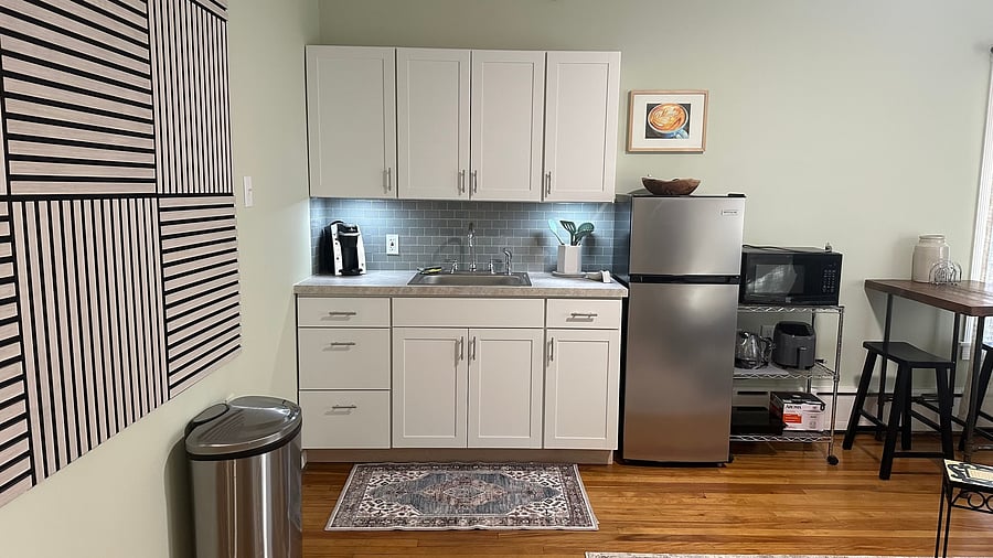 Since taking this picture, we have added a 4' professional-grade stainless steel table with shelves for added counter space.
