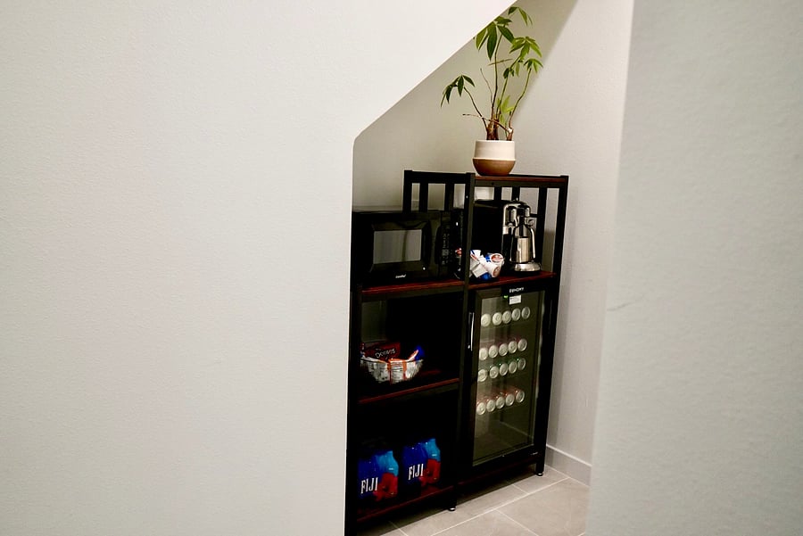Kitchenette coffee station with mini fridge/freezer. Induction cooktop and air fryer included.