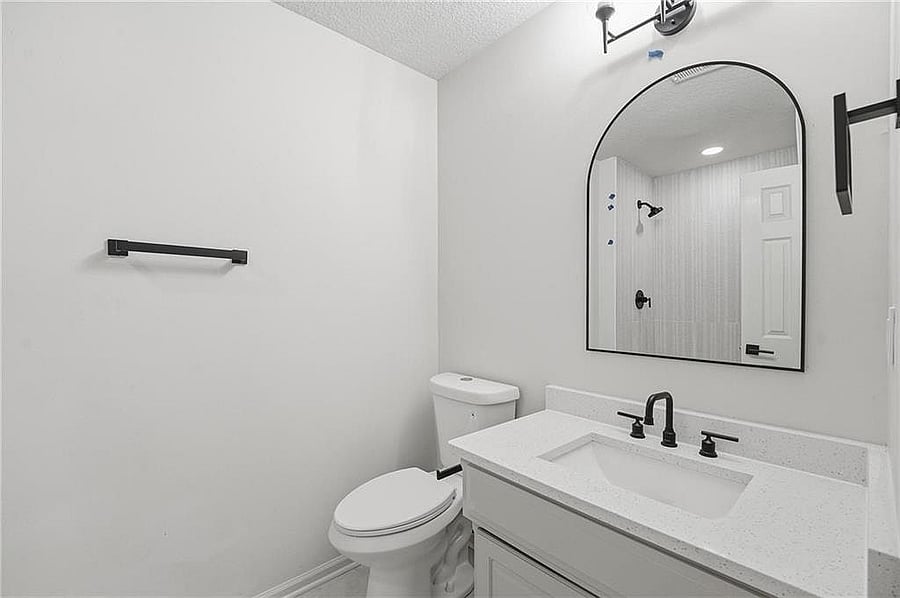 Second upstairs bath with quartz vanity