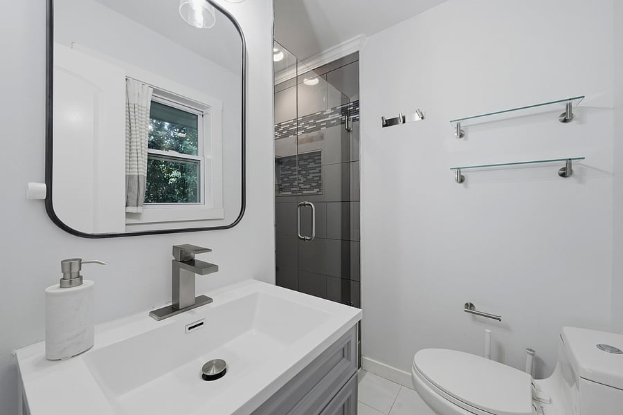 Master bathroom with frameless glass shower door