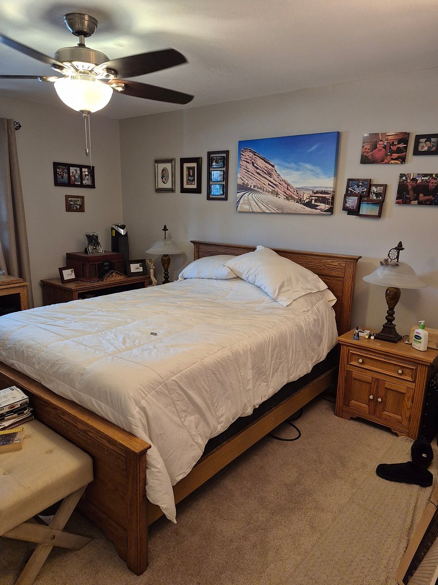 Master bedroom with oak furniture.