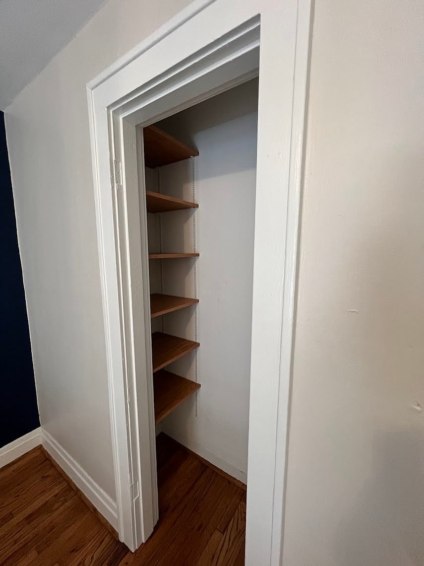 Handmade shelves in the bedroom closet.
