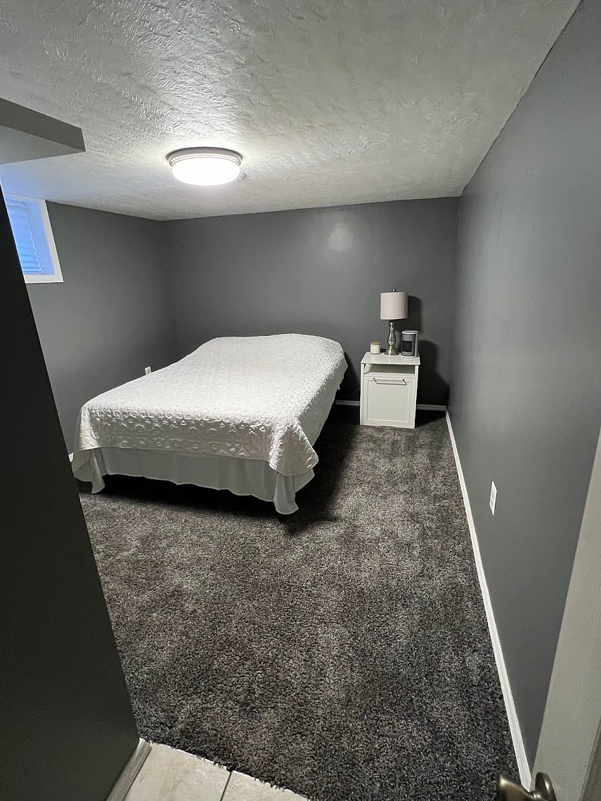 Basement includes an additional room with a queen-size bed. This room does not have egress.