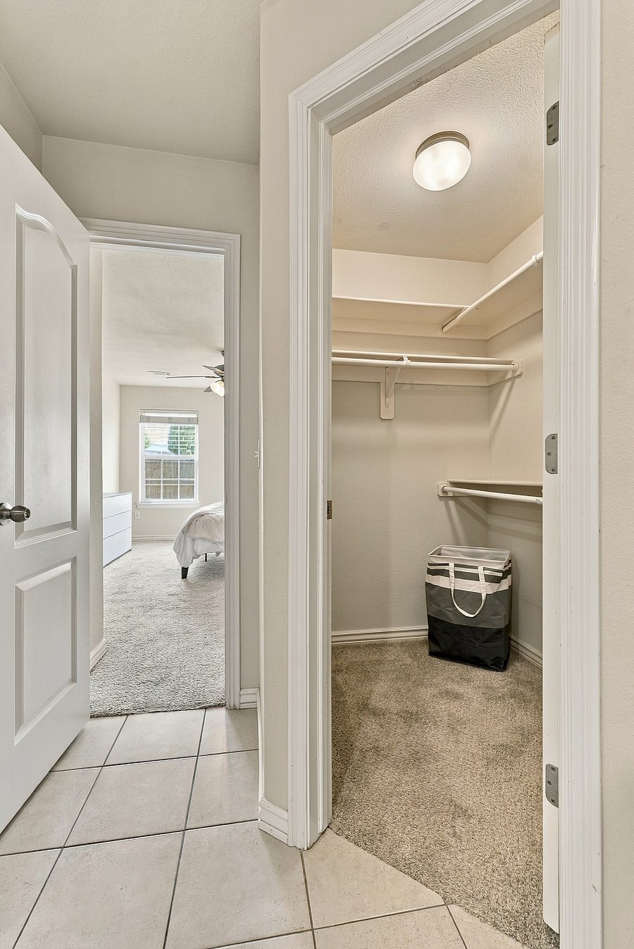 Walk-in closet attached to primary bath.