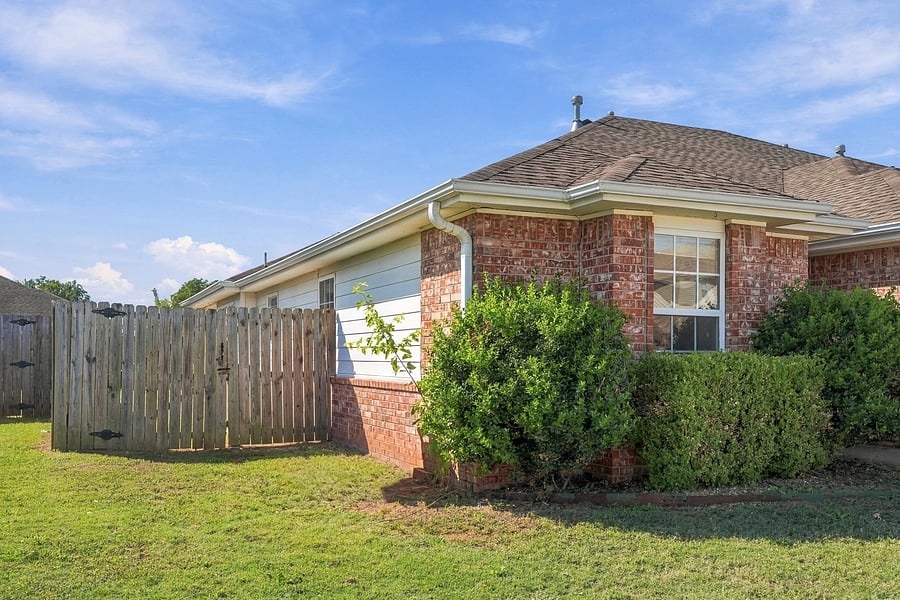 Fenced yard with gate.