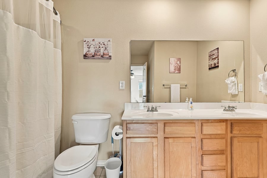 Primary bath with dual vanities.