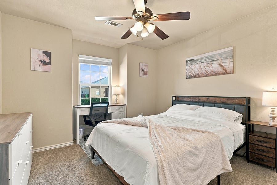First spare includes queen size bed, full size closet, dresser, and full size desk for your office needs.