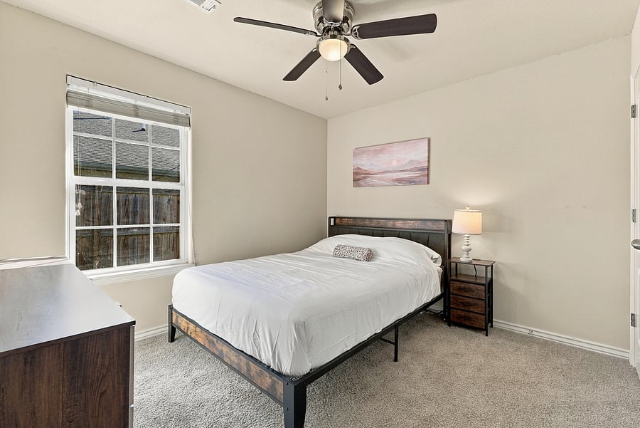 Second spare offers queen size bed, full size closet, and dresser.