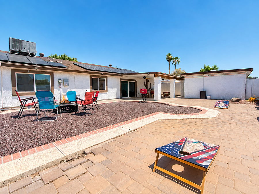 Enjoy a spacious, fully walled backyard courtyard perfect for afternoon games and outdoor entertainment.