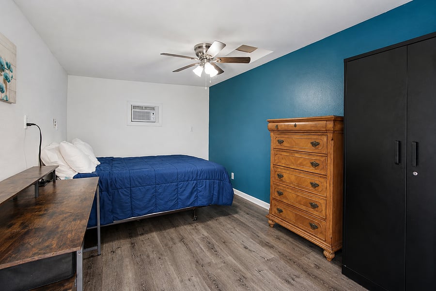 Unpack your wardrobe easily into the large armoire and dresser during a productive long-term stay.