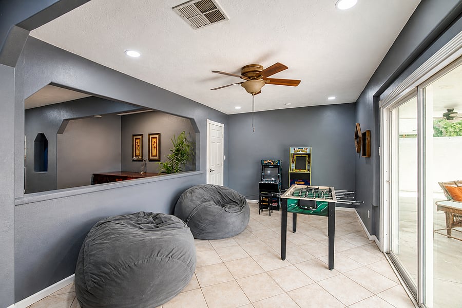 Lounge on oversized, comfy beanbag chairs with direct access to the covered patio.