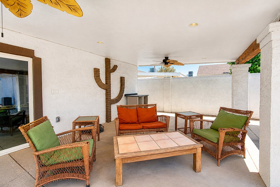 Step right outside through the sliding glass doors into your private, shaded backyard sanctuary.