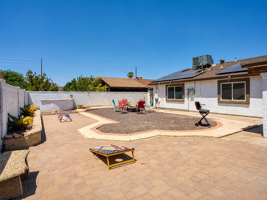 Move effortlessly between a game of beanbag toss, a BBQ cookout, and relaxing by the central fire pit.