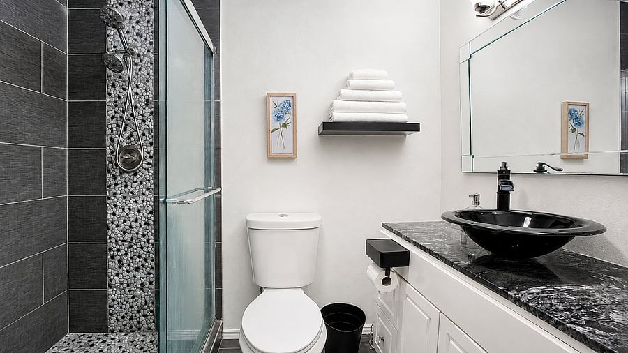 Unwind with a refreshing wash in a beautifully designed bathroom stocked with travel essentials.