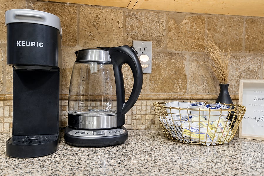 Fuel your day at our complimentary coffee station, fully stocked with a variety of pods and sweeteners.