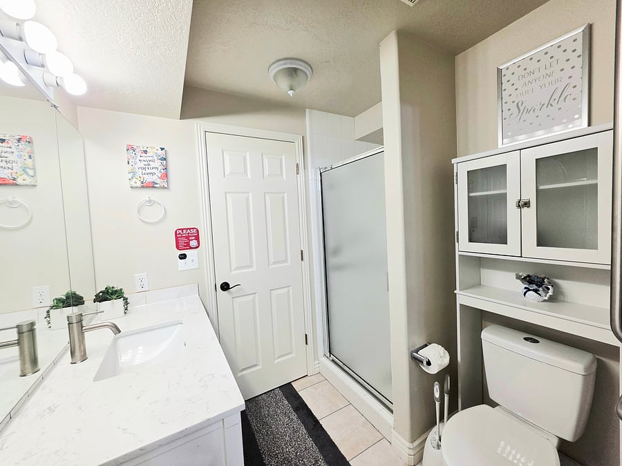 Bathroom in first floor next to laundry room.
