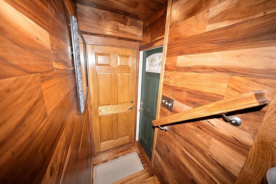 Side entrance stairwell and pantry.
