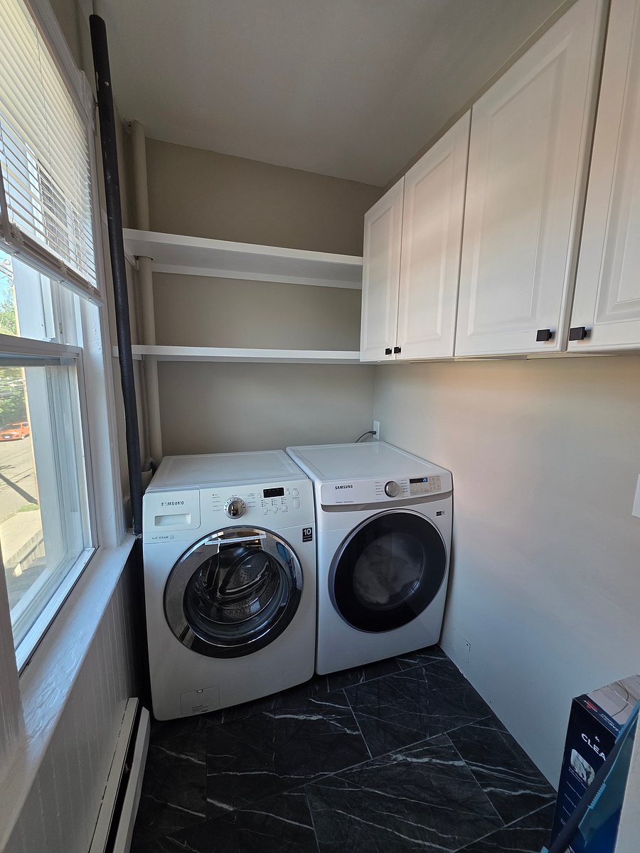 full size washer and dryer plus extra storage is really nice. This is just off the kitchen.