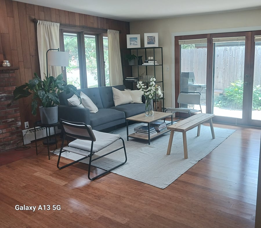 Living room with French door to private deck