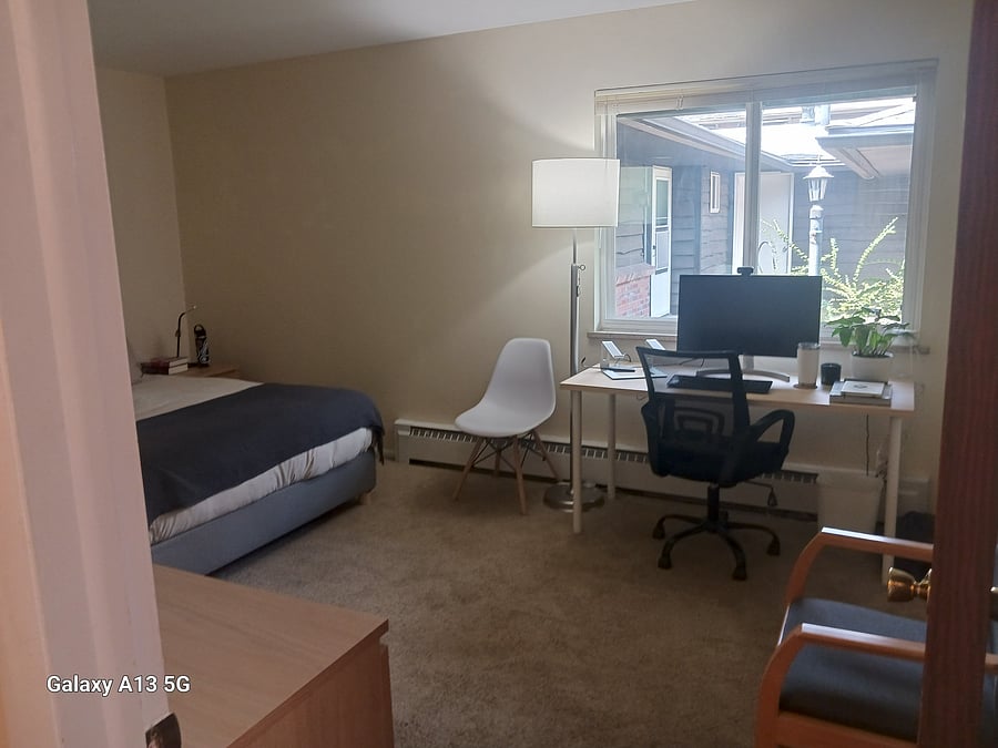 Primary bedroom. Has access to full bathroom. Half bathroom is in the hallway