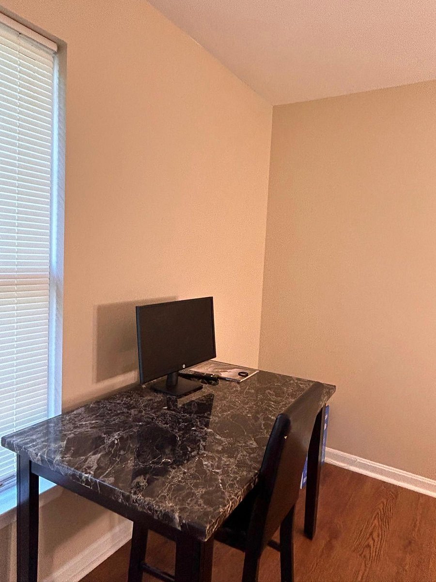 This si Room 2 upstairs complete with an office table for you to do your important work.