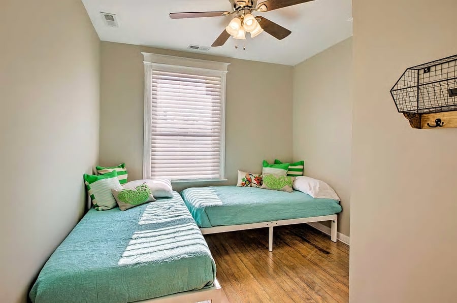 Bedroom 3 with two twin beds and closet on second floor.