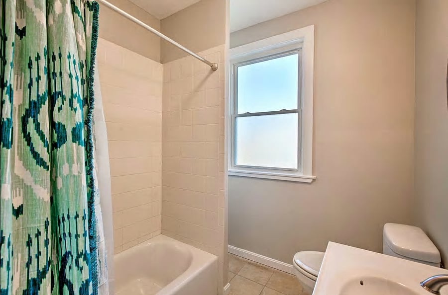 Bathroom 1 with tub/shower on second floor.